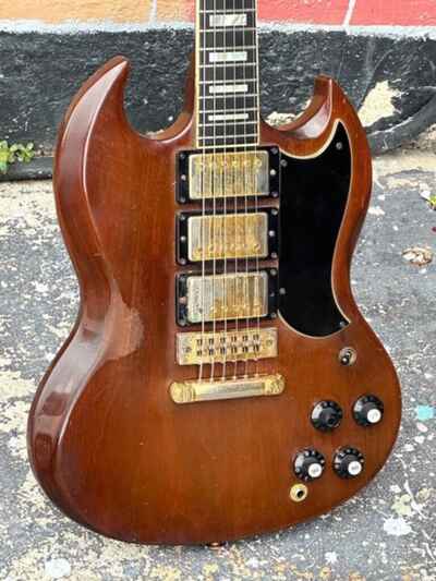1974 Gibson SG Custom a cool 3 pickup Walnut finished beat sweet neat machine.
