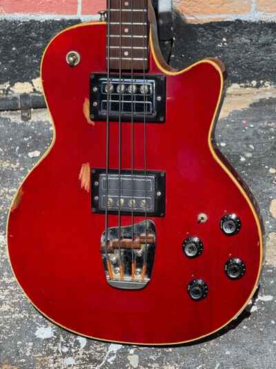 1972 Guild M-85 Bass in a see-thru Cherry Red finish its Cheryl Crows favorite !