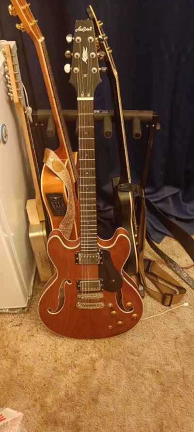 Aria Pro II semi-hollow electric guitar with stagg gig bag