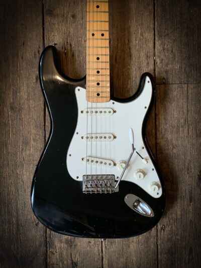1973 Fender Stratocaster in Black with Maple 3 bolt neck with hard shell case.