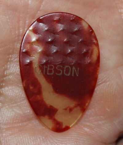 VINTAGE 1970S GIBSON IMPRESSED GUITAR PICK